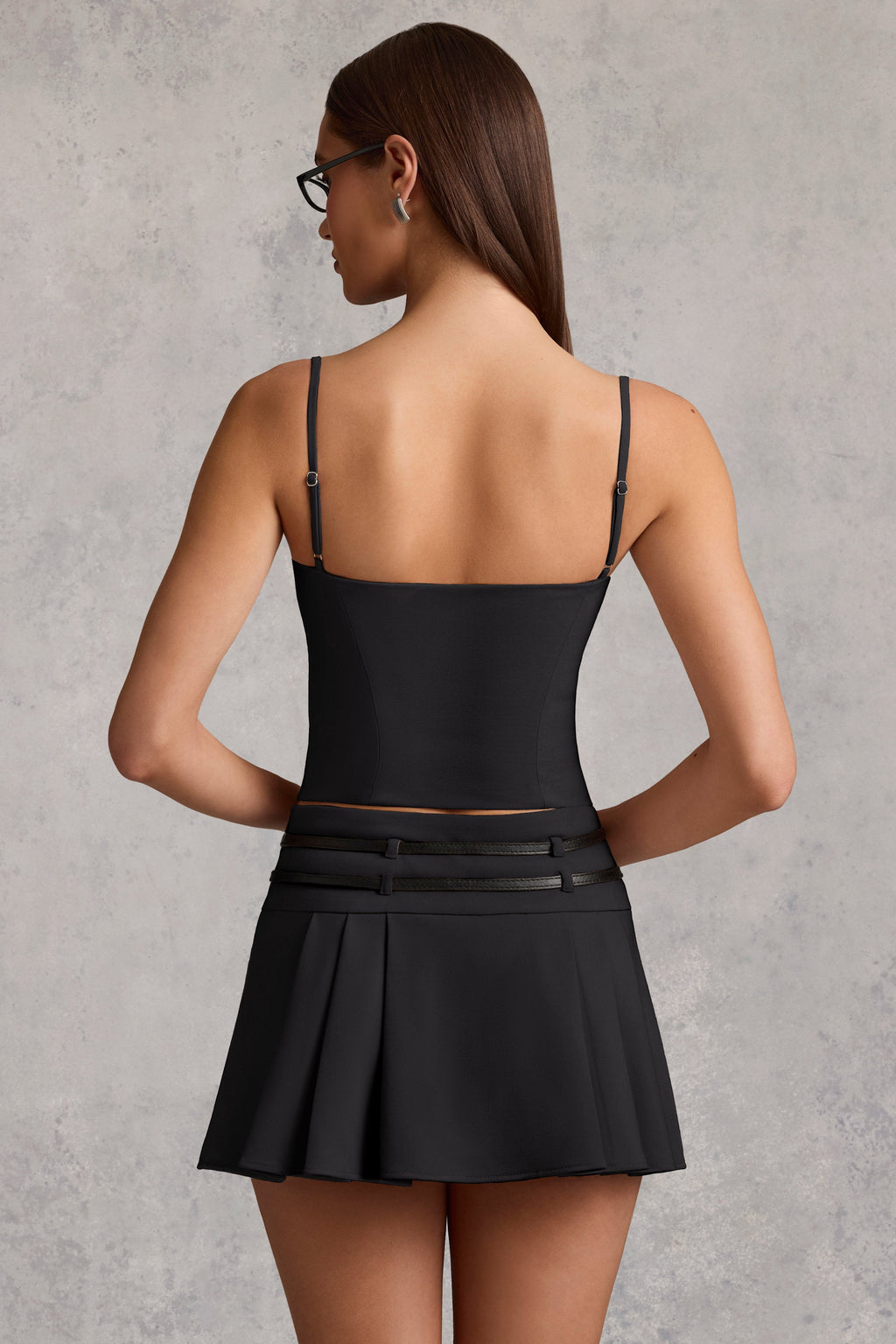 Belted Low-Rise Pleated Mini Skirt in Black