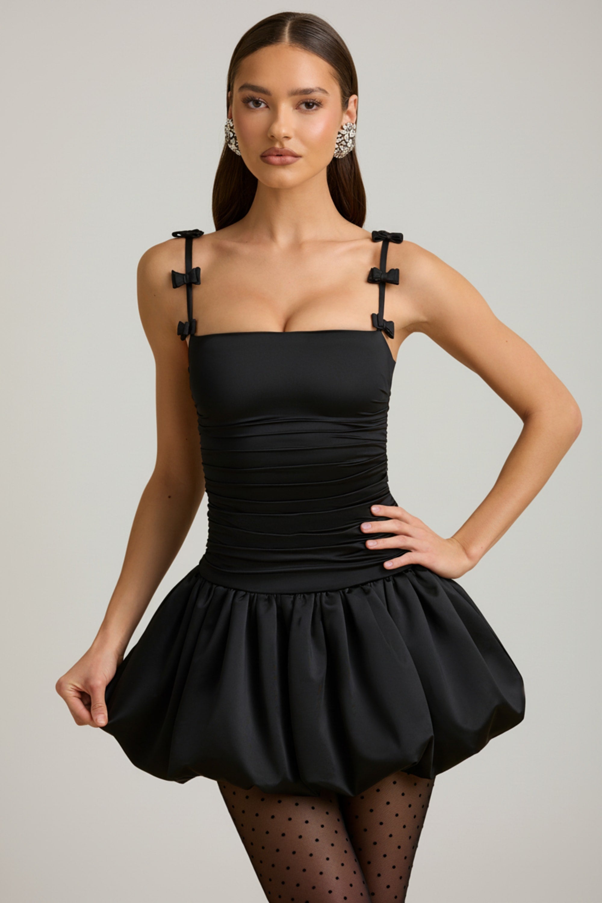 Bow-Detail Ruched Bubble Hem Mini Dress in Black