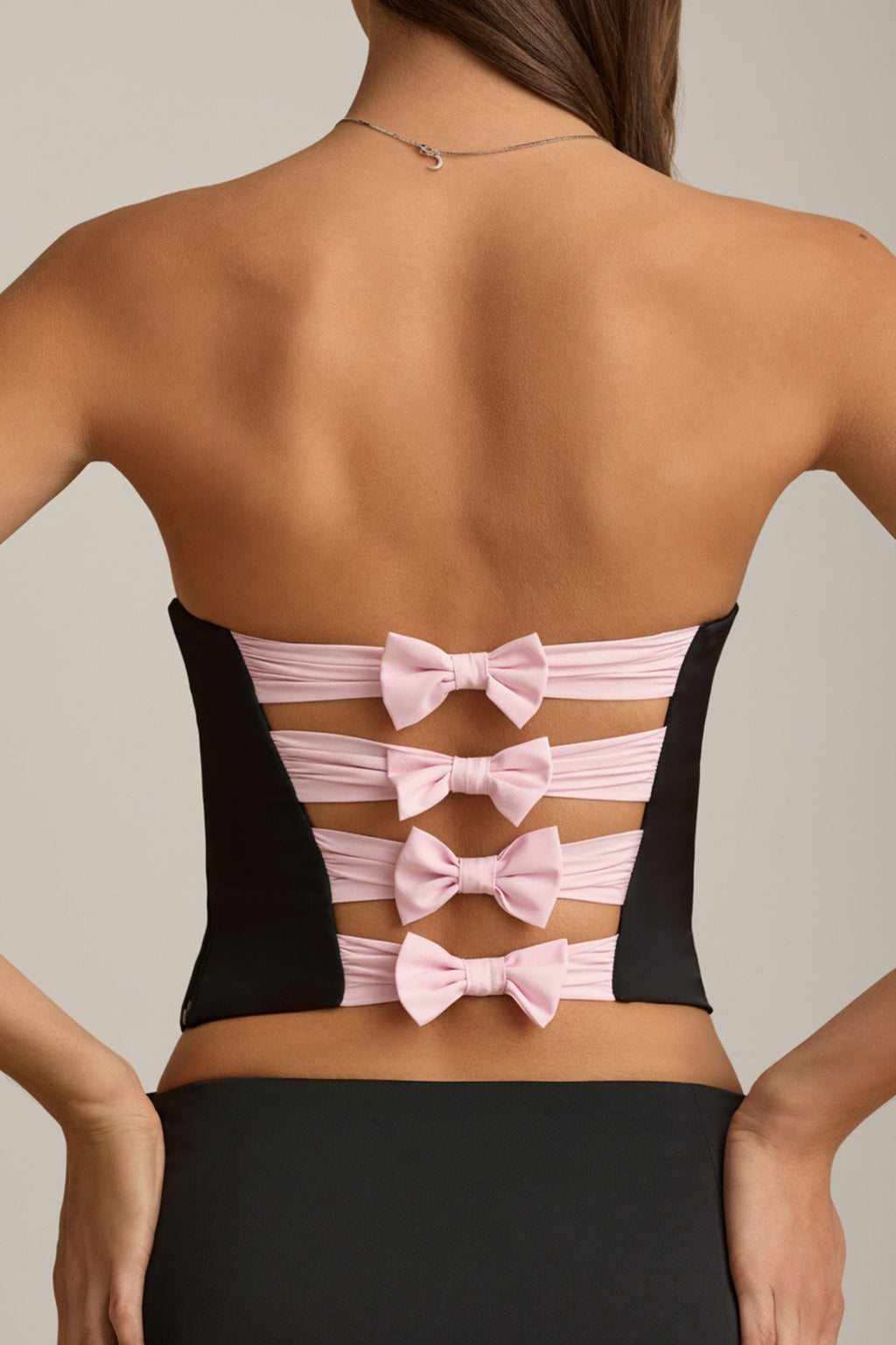 Cut-Out Bow-Detail Corset Top in Black