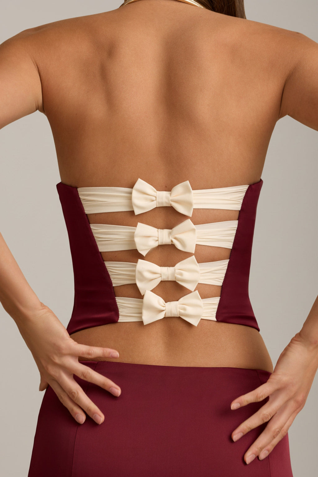 Cut-Out Bow-Detail Corset Top in Wine Red