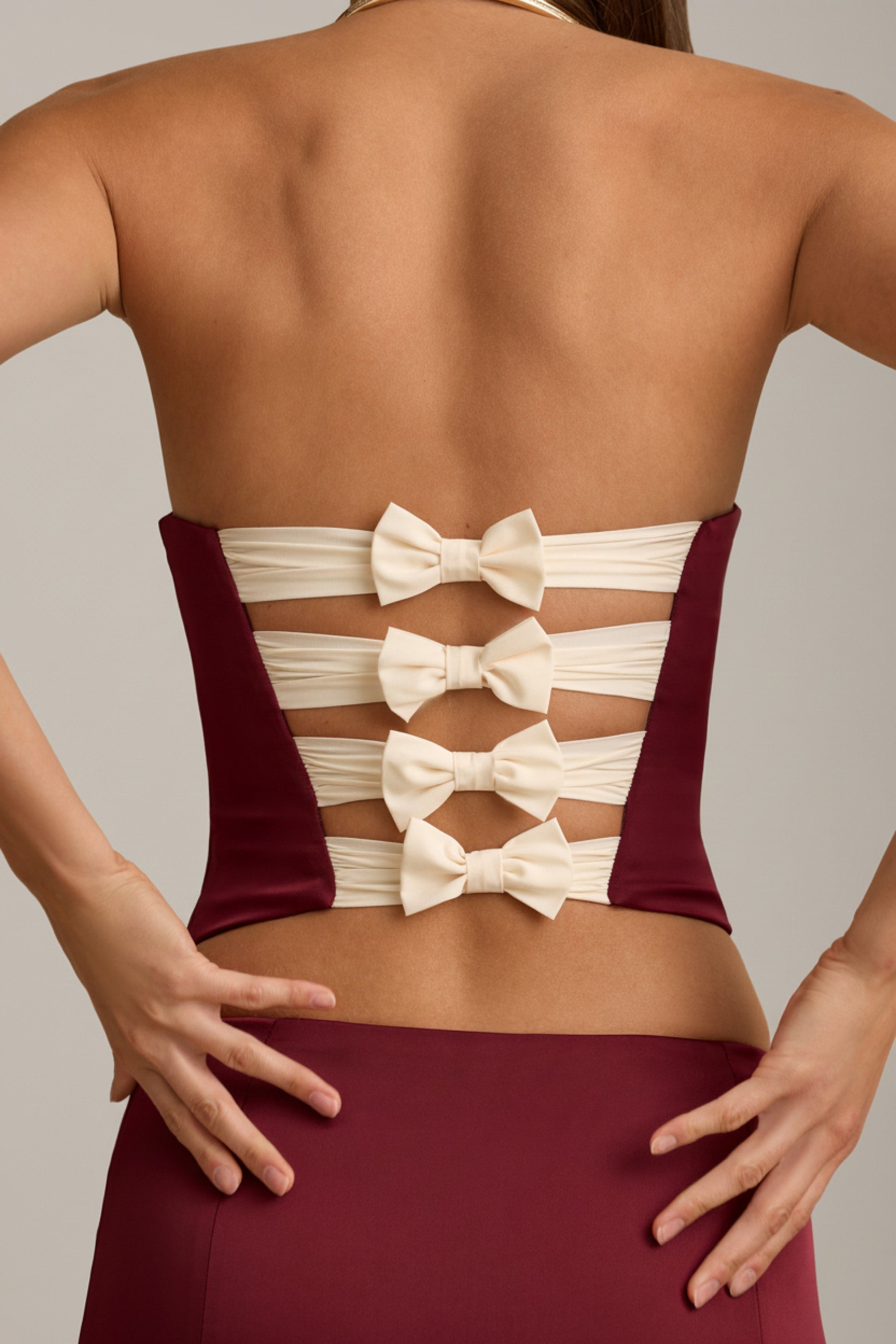 Cut-Out Bow-Detail Corset Top in Wine Red
