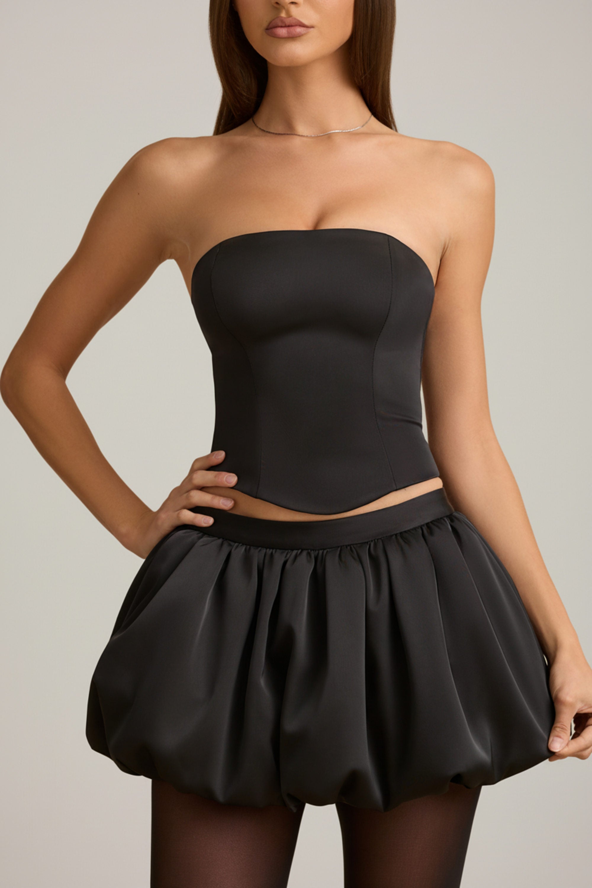 Bubble Hem Mid-Rise Mini Skirt in Black