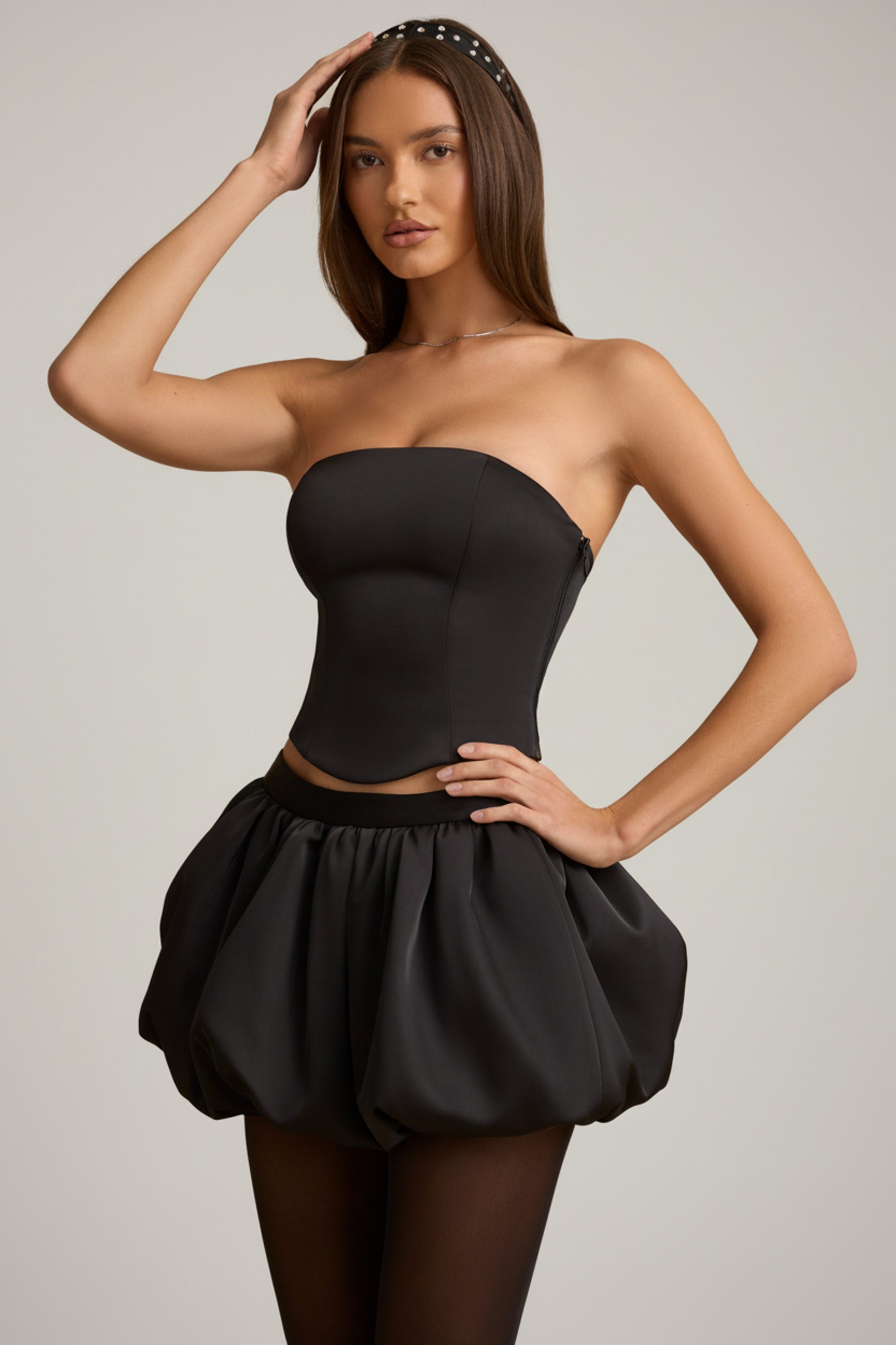 Bubble Hem Mid-Rise Mini Skirt in Black