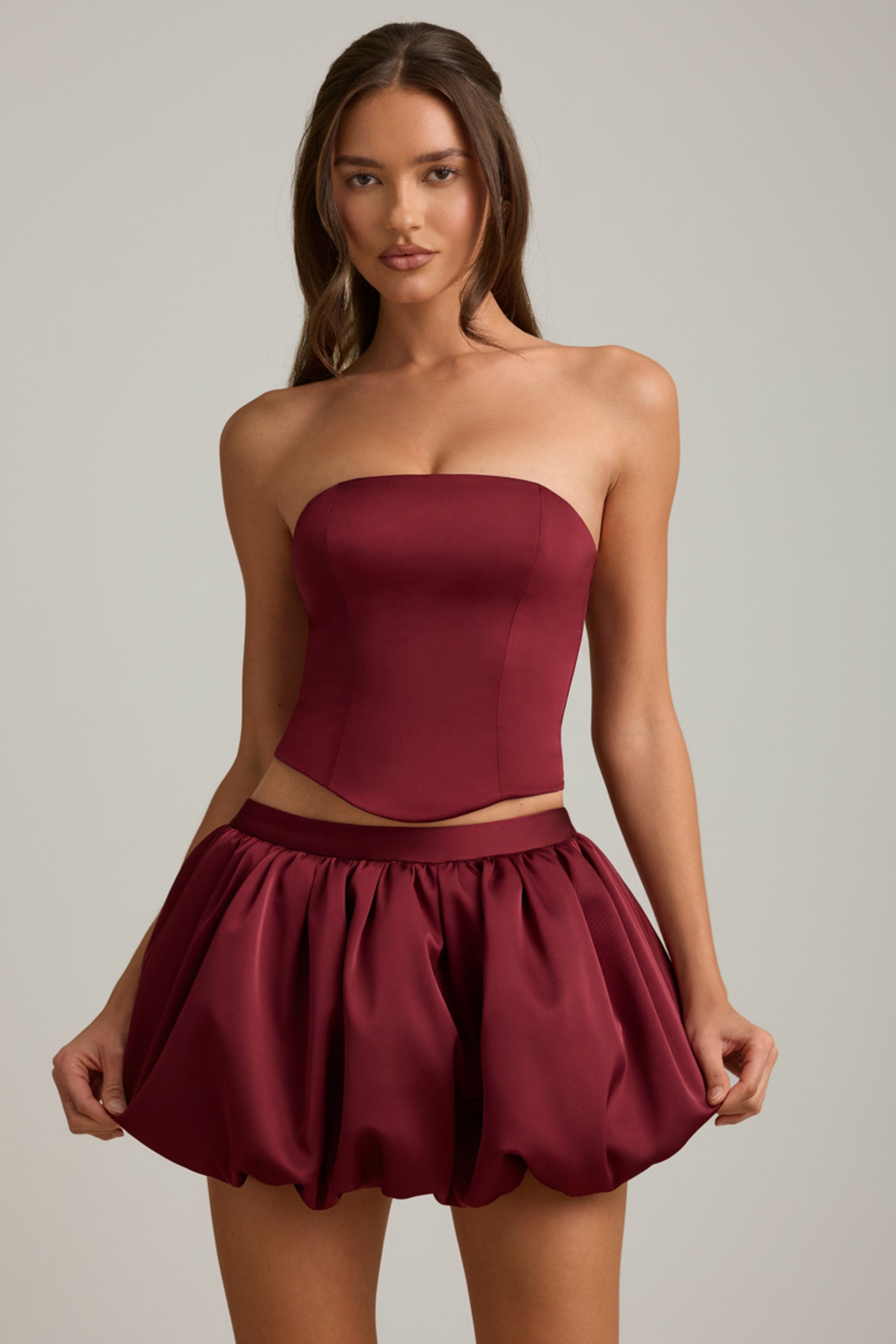 Bubble Hem Mid-Rise Mini Skirt in Wine Red