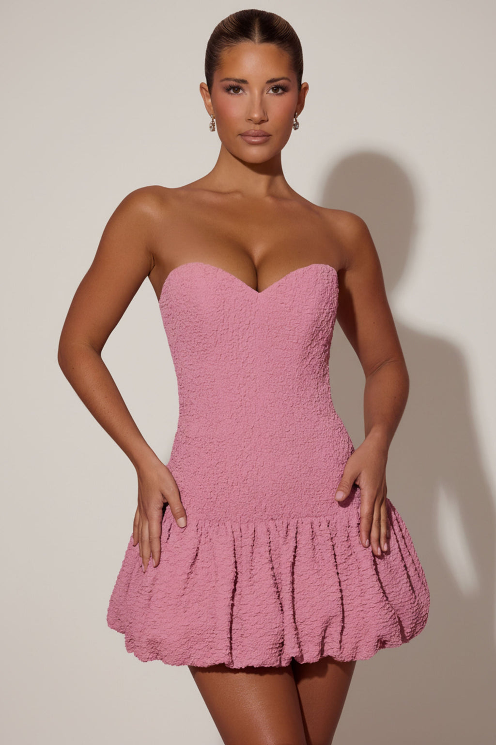 Cut-Out Bubble Hem Corset Mini Dress in Dusty Pink