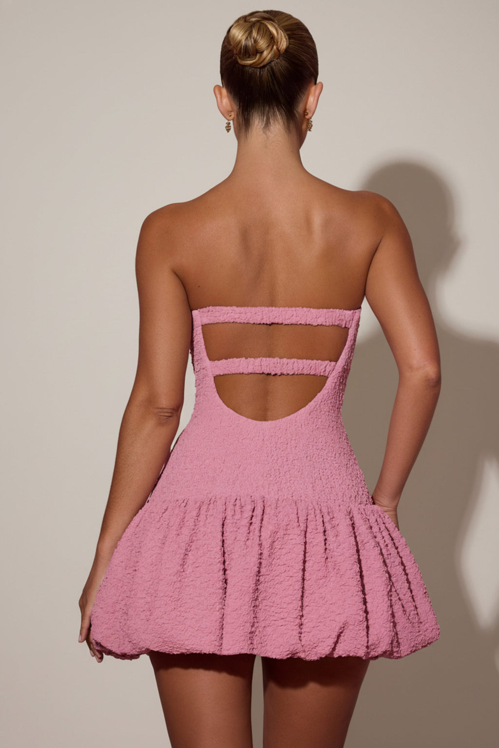 Cut-Out Bubble Hem Corset Mini Dress in Dusty Pink